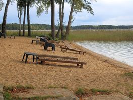 The beach on the caravan park's lake.