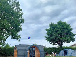 Hot air balloon over one of the pods