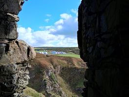 View of caravan site from dunskey castle.
