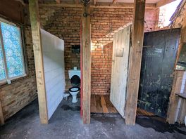 Toilet and shower block