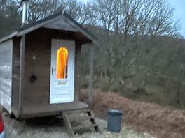 Cozy hut with log burner