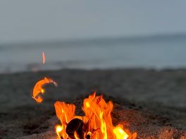 Romantic beach campfire