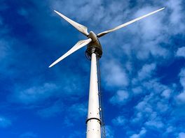 Wind turbine near pod