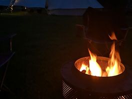 Evening by the camp fire.