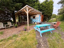 Fab place to charge your phones and fridge to keep everything in .
