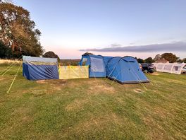 No specific pitches so can pitch any size tent