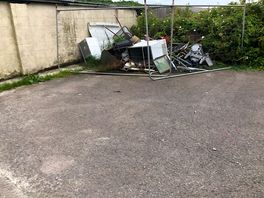Dog poo in parking area and scrap metal on view!