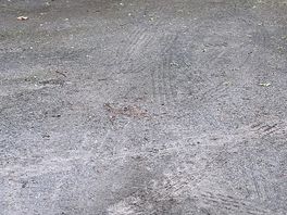 The muddy hard standing