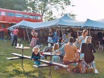 People enjoying food and drink at bar paradiso, neata valley 2022