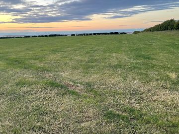 Sunset at the campsite field