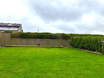 Front view of serviced grass pitch