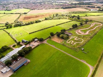 Aerial view of the farm and caravan park