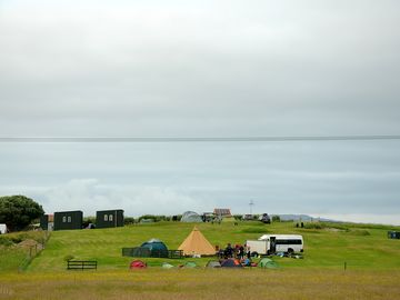 View of site from the opposite hill