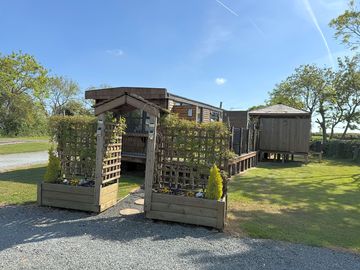Wooden lodge with a hot tub