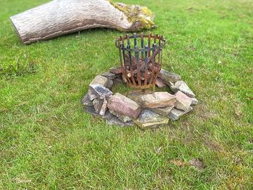 Communal fire pit with log seating