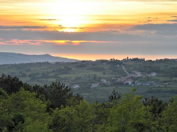 Views towards koper bay, the dolomites and the alps