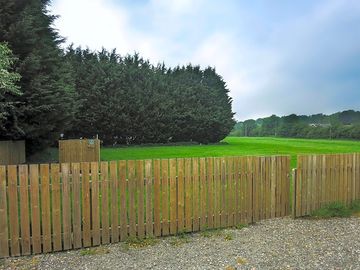 Large, mature trees provide a private atmosphere
