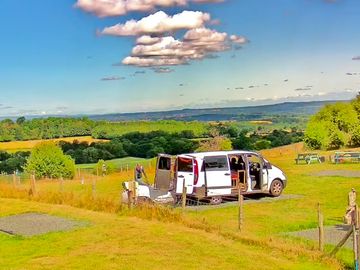 Small campervan on hardstanding