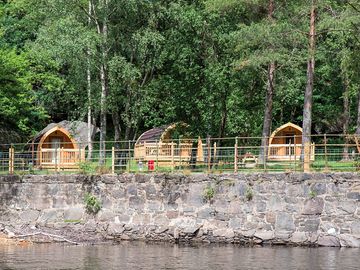 The lodges seen from the loch