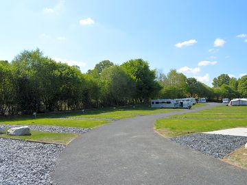 Fully-serviced hardstanding and grass tent, campervan or trailer tent pitch