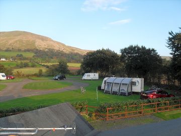 Caravan and awning in front of benbradagh