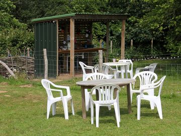 Picnic tables and chairs around the site