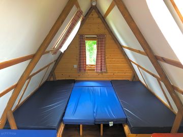 Wigwam with the mattresses down ready to set up your bed linen