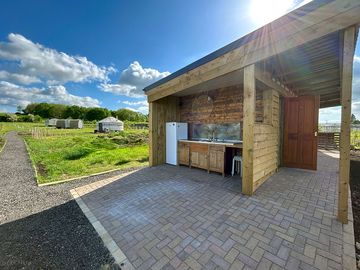 Shared washing-up facilities and toilet/shower block