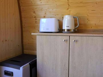 Small kitchenette and fridge