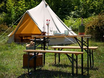 Bell tent with picnic table