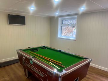 Tv room with pool