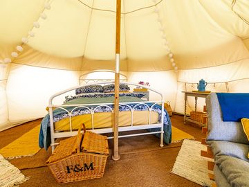 Interior of tent. 2 single futon sofas in each tent, that can be made up for children age 2-12 yrs.