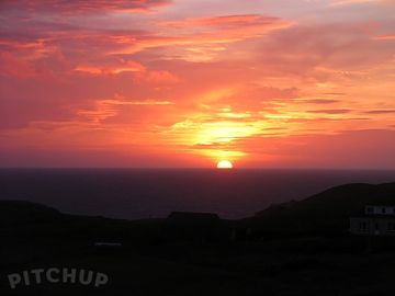 Sunset viewed from glamping pod site on croft 5 mangersta, uig, isle of lewis, outer hebrides.