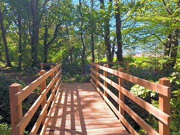 New bridge on one of the woodland paths, on site.