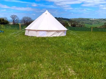 The bell tent being put up for the first time