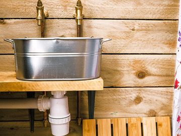 Sink inside the shared toilet/shower trailer. photo taken by boutique camping.