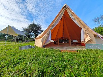 Bell tent and cover with solar panel