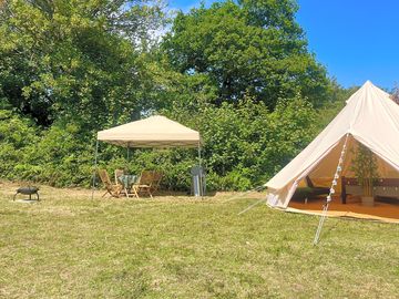 Private seating area with small kitchen area and gazebo.