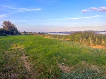 Camping field by the severn river