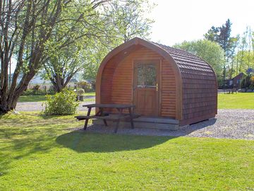 Dog-friendly wooden camping pod