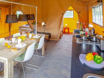 Open plan lounge, dining space and kitchenette