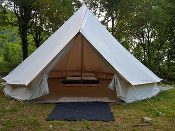 You can book this tent with a mattress in addition to your pitch.