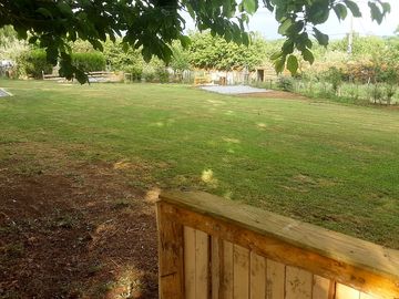 Raised seating platform in the garden