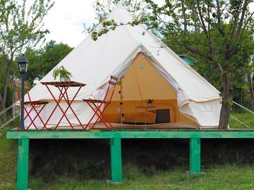 Bell tent on a raised deck