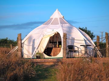 Our luxury glamping belle tents, furnished with a comfortable double bed and various cosy amenities