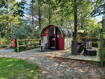 Red pod, deck and barbecue area