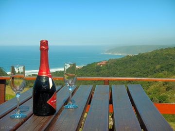 Champagne on deck with ocean views