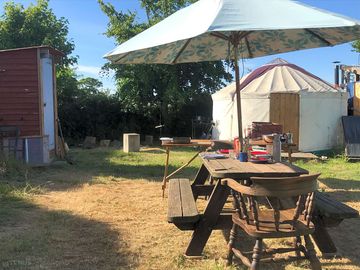 Picnic table and yurt