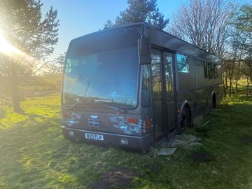 The shuttle bus bathed in light as the sun set