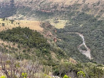 Mountain trail with river sightings
